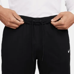 Nike Storm-FIT ADV Waterproof Golf Pants 11 Nike Storm-FIT ADV Waterproof Golf Pants -ForeGear Shop Nike AW22 Storm FIT ADV Waterproof Trousers Black White DN1951 010 WPNIK014 Model 3